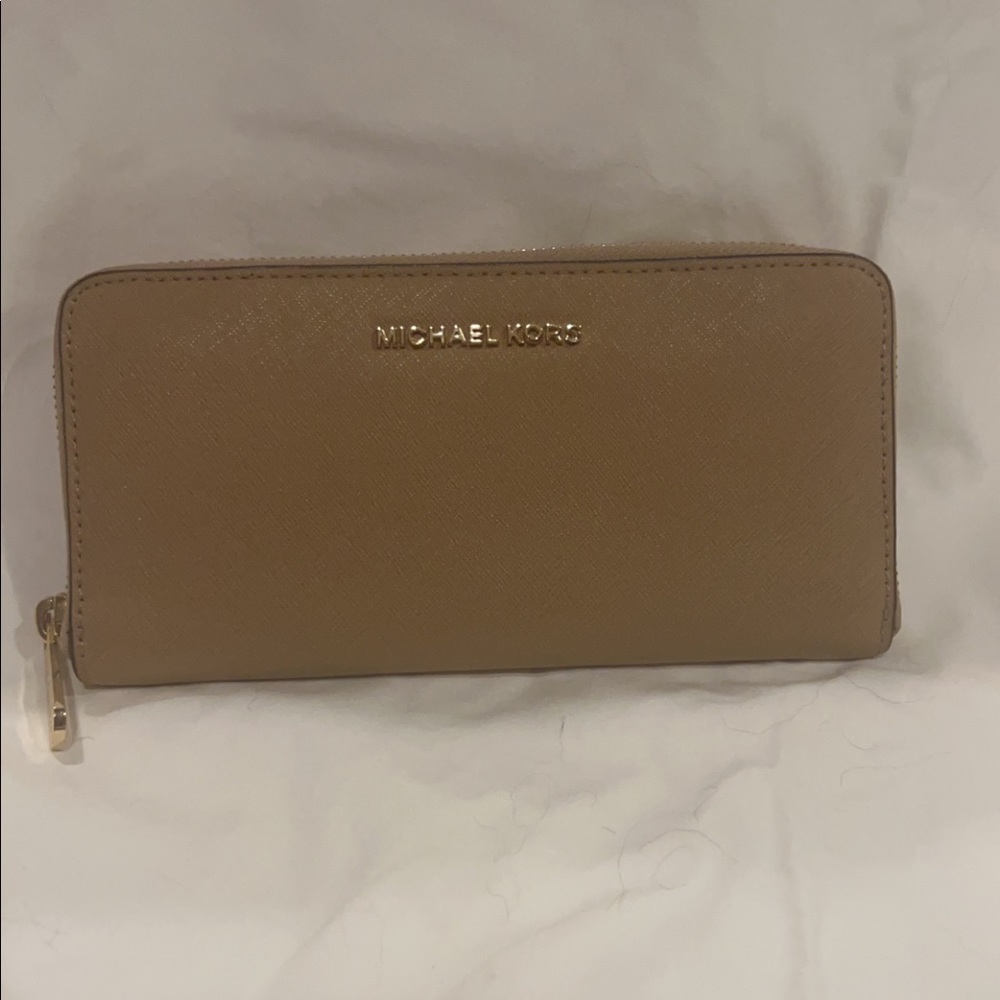 Tan Michael Kors wallet in great condition and new!